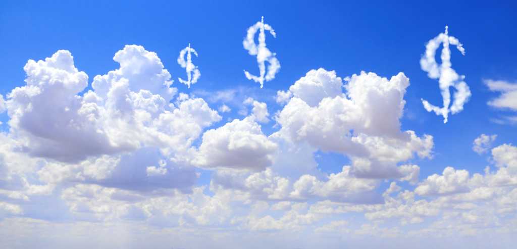 Cloud costs. US dollar signs floating above clouds in the sky.