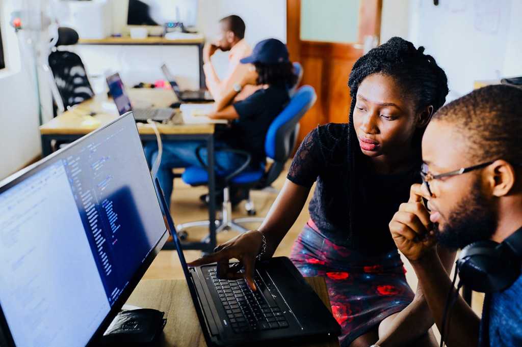 teamwork / developers / programmers / collaboration / conversation, discussion, gesturing
