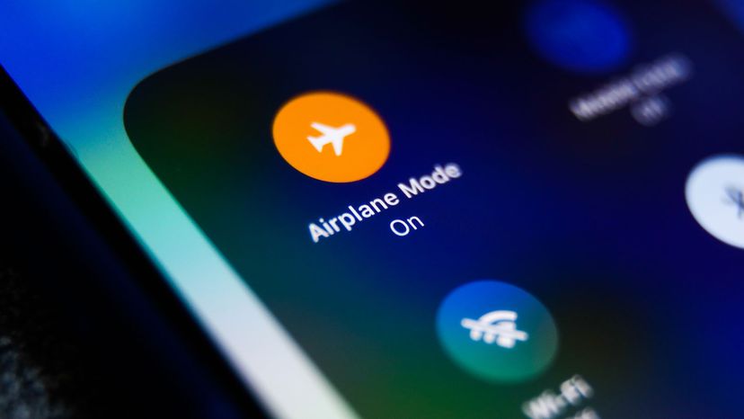 Airplane Mode icon is seen displayed on a phone screen