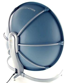 The VisionStation has a large parabolic shell that is used to display the image projected by the wide-angle lens.